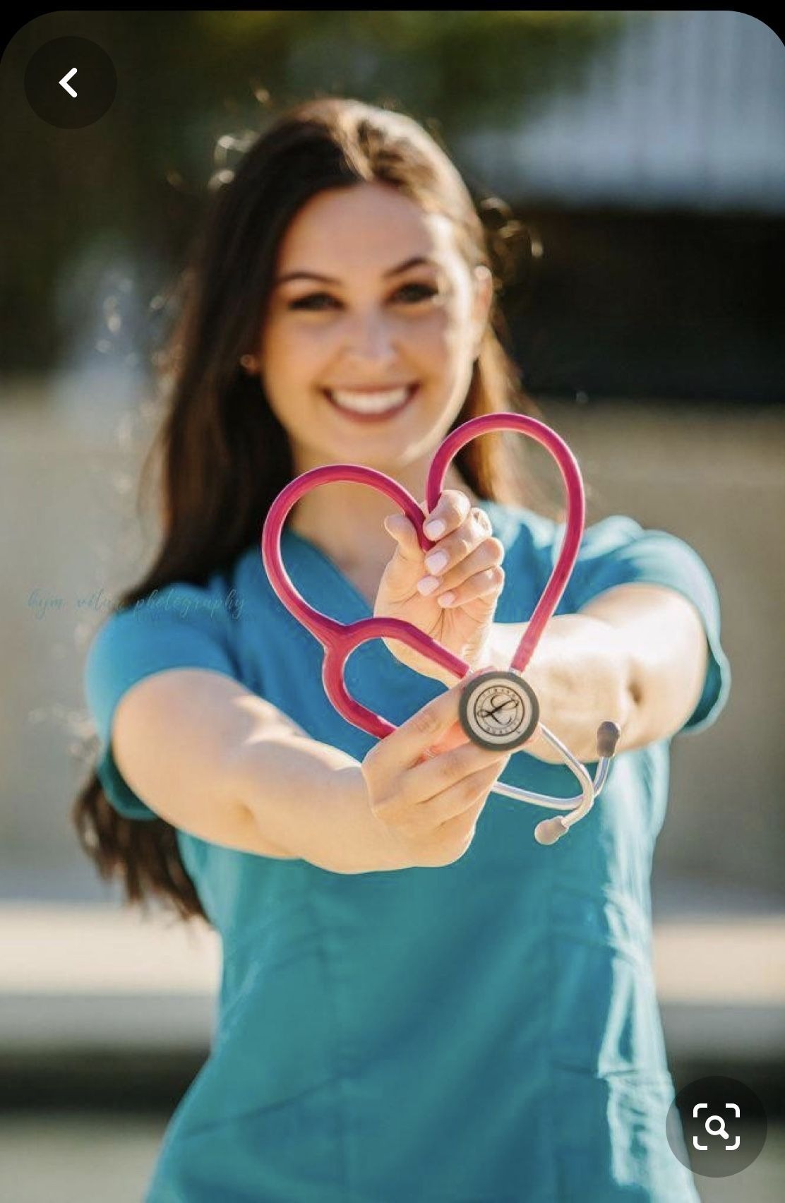 Pink stethoscope heart shape with nurse