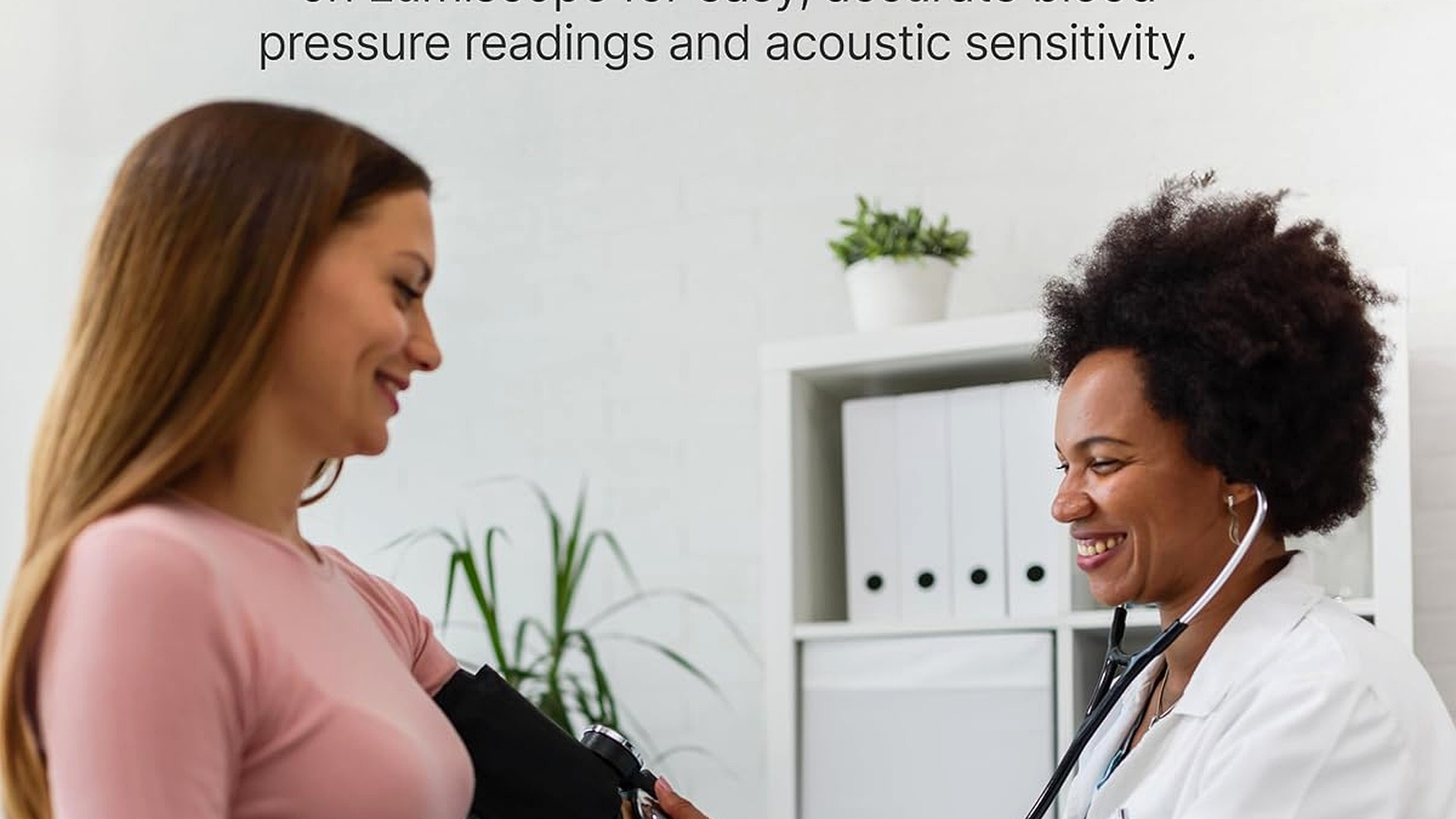 Clinician using a stethoscope with a patient